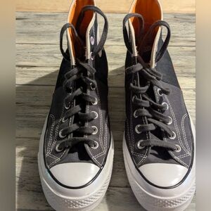 Converse Black and White High-Tops with Orange Lining